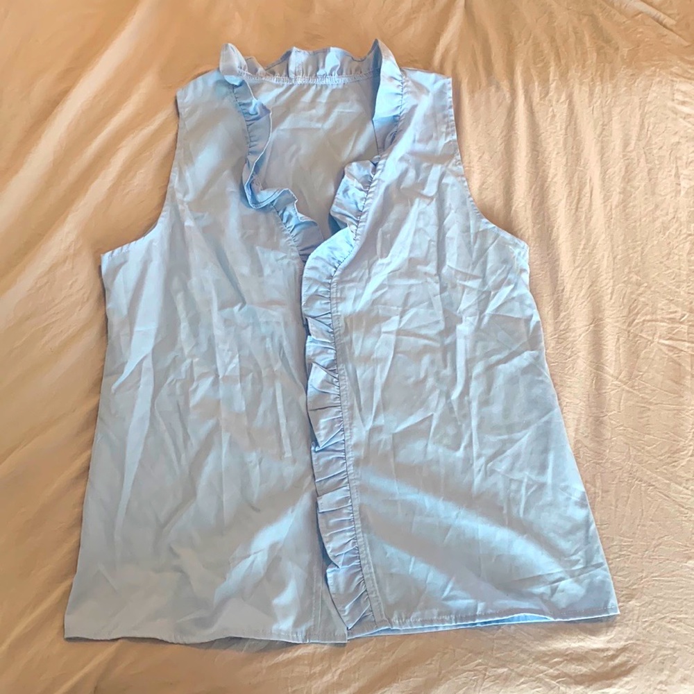 Ruffle edge blue blouse